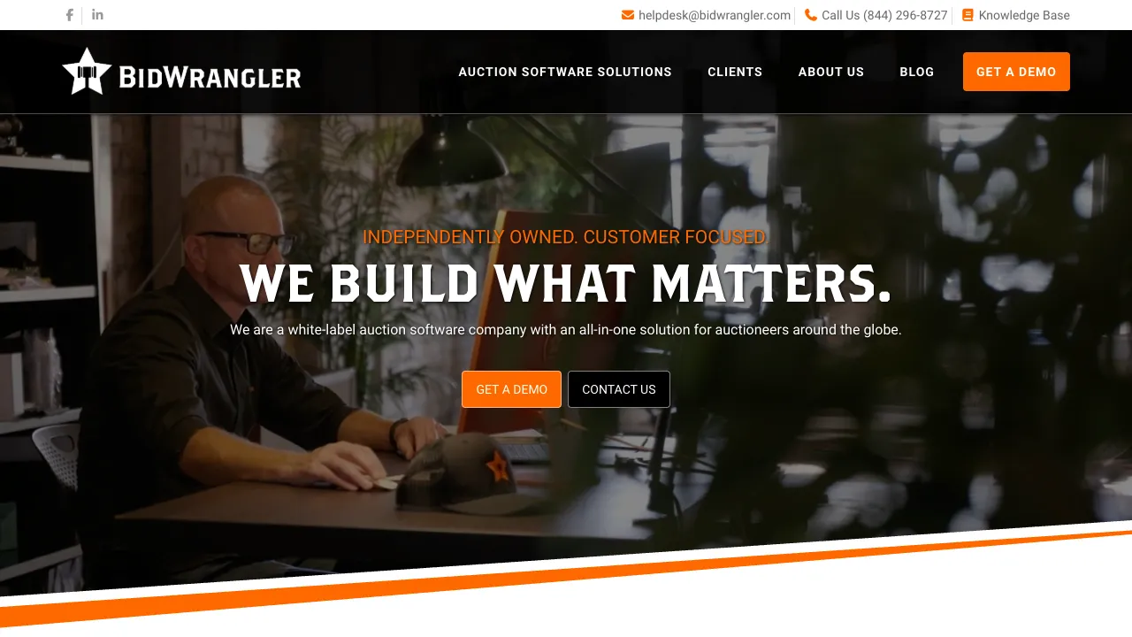 BidWrangler homepage for white-label auction software